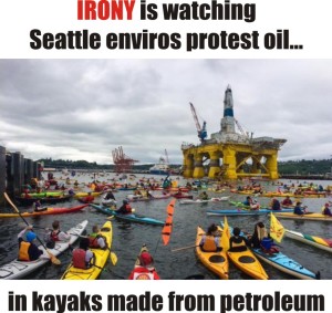 IRONY Seattle kayakers protest oil in kayaks made from petroleum
