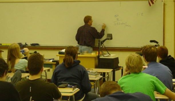 https://www.cfact.org/wp-content/uploads/2017/06/High-school-teacher-612x353.jpg