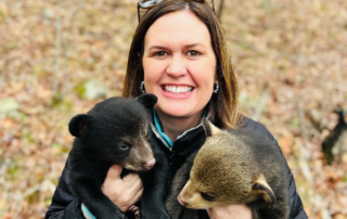 Governor Huckabee Sanders holds bear cubs, wants to bolster outdoor recreation in her state